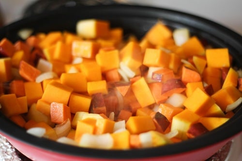 Sweet potatoes and onions cooking in a tagine