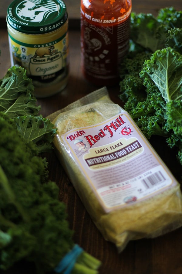 Nacho Cheese Kale Chips - Super crispy and addicting! Made with tahini and nutritional yeast #vegan #healthy #snack #recipe @bobsredmill
