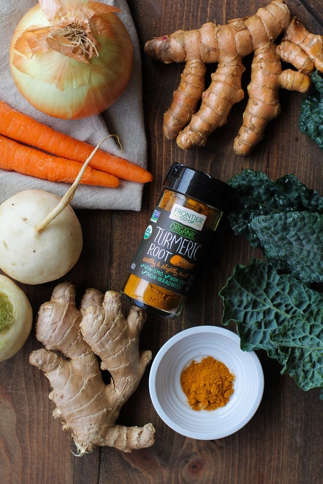 Ginger and Turmeric Braised Chicken with turnips, kale, and carrots in coconut milk broth | TheRoastedRoot.net #healthy #dinner #recipe
