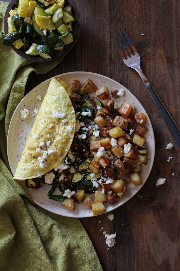 Roasted Vegetable and Caramelized Onion Omelette with Feta | TheRoastedRoot.net #vegetarian #recipe #healthy #breakfast
