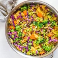 Spaghetti Squash Stir Fry with carrots, broccoli, cabbage, green onion, ginger, and coconut aminos - an easy paleo side dish | TheRoastedRoot.net #glutenfree