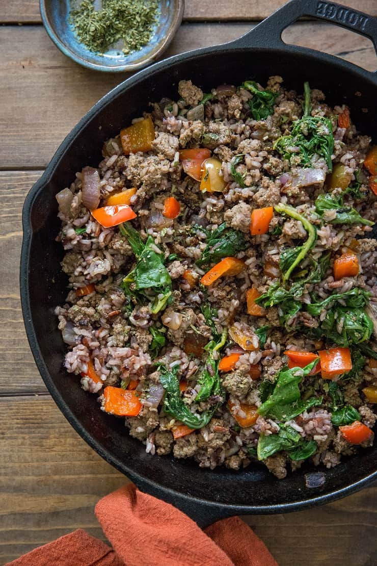 One-Skillet Ground Beef and Wild Rice with onion, garlic, rainbow chard, and bell pepper - an easy, quick well-balanced meal recipe ready in under 1 hour | TheRoastedRoot.net