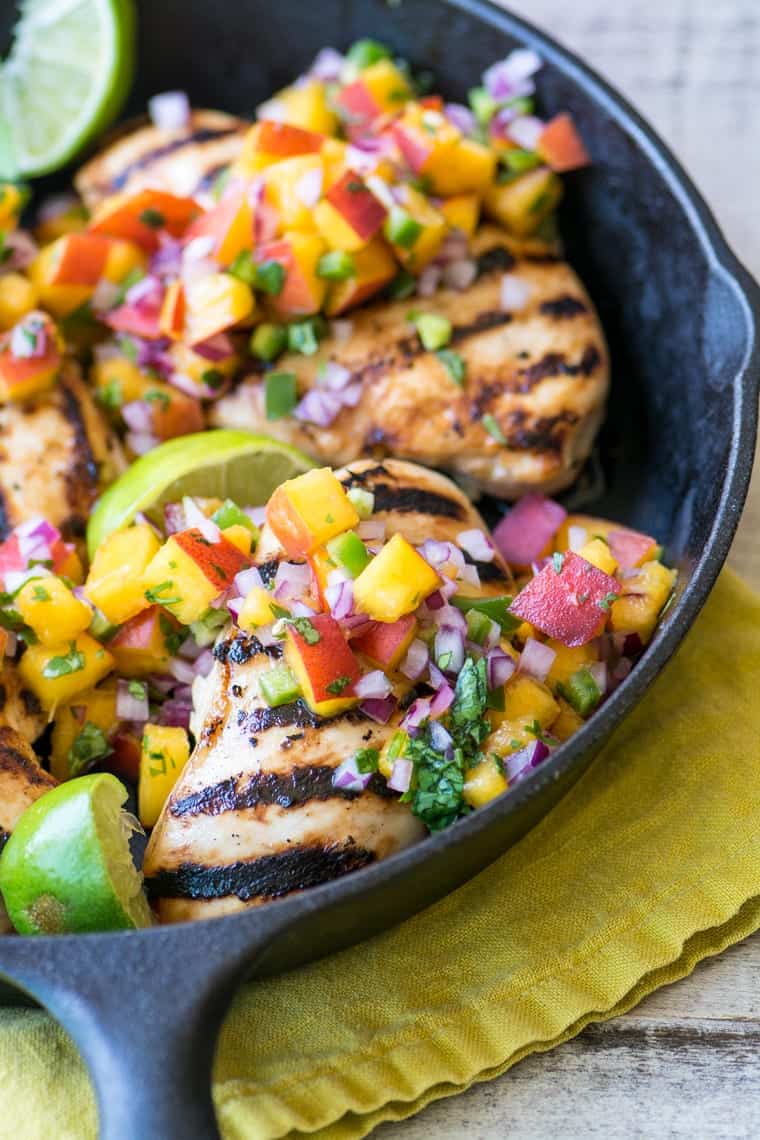 Grilled Chicken with Peach Jalapeรฑo Salsa ~ this lightning quick meal is low calorie, low fat, low carb, gluten free, Whole 30 and Paleo compliant, not to mention Weight Watchers friendly. But more importantly, itโs healthy and insanely delicious.