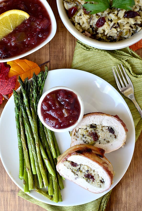 Bacon-Wrapped Turkey Breast with Wild Rice Stuffing and Cranberry Apple Chutney from Iowa Girl Eats ย - If you are feeding a crowd this year, keep this Bacon-Wrapped Turkey Breast recipe in your back pocket for a festive meal this season. Youโll love it!