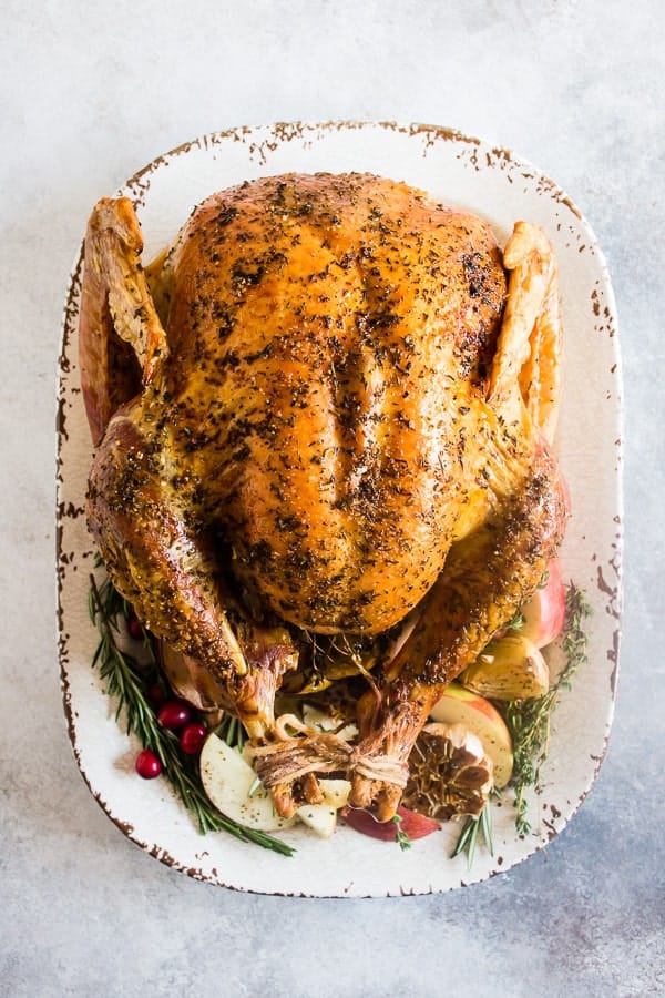 Garlic Herb Maple Roast Turkey from Nutmeg Nanny - This garlic herb maple roast turkey is packed full of flavor with just a touch of maple syrup sweetness. Itโs the perfect addition to any holiday table!ย