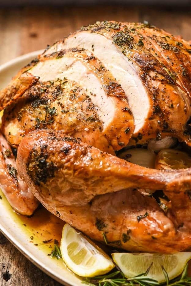 Easy Garlic Herb Oven Roasted Turkeyย from NeighborFood ย - A classic approach to your Thanksgiving centerpiece! This recipe provides the ultimate guide to roasting a turkey from start to finish and includes a video!