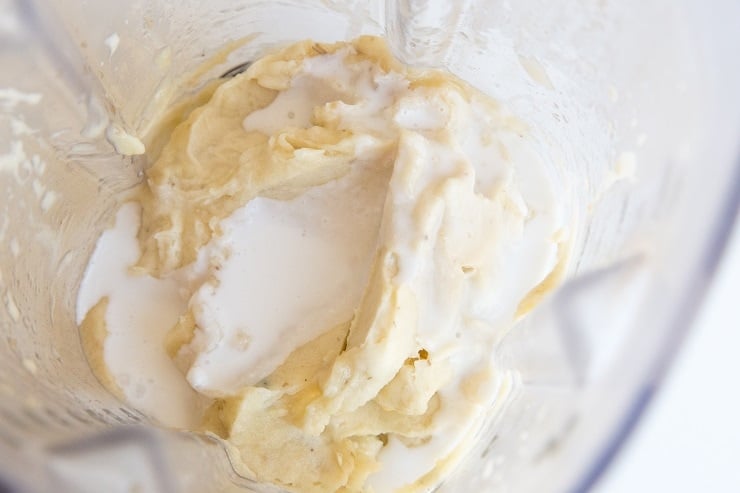 Add coconut milk if the bananas need extra help in blending