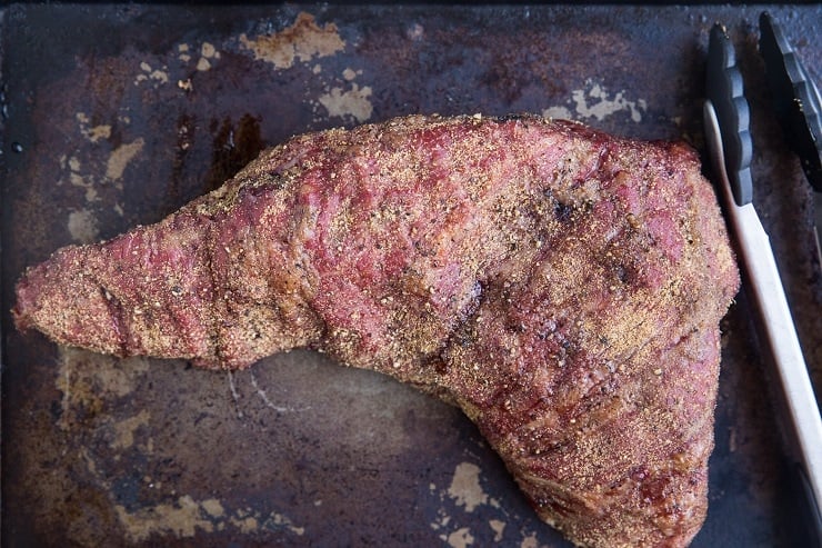 Finished smoked tri tip on a baking sheet