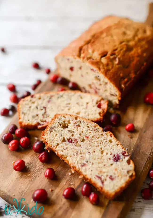 Cranberry nut bread is an easy holiday treat full of festive flavors.ย And this cranberry quick bread recipe uses up leftover cranberry sauce. Replace the regular flour with gluten-free flour to make this bread GF.