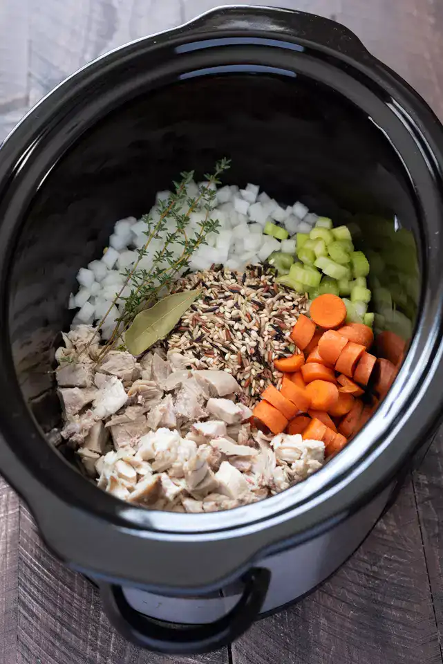 Put that leftover turkey to the best use possible in this Slow Cooker Turkey Wild Rice Soup!ย Itโs hearty, naturally gluten free, and is the easiest dump โn go recipe!