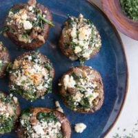 Ground Beef & Feta Stuffed Mushrooms with caramelized onion, garlic, and spinach makes for the perfect bite! This simple yet powerfully flavorful appetizer recipe is a winner for any gathering!