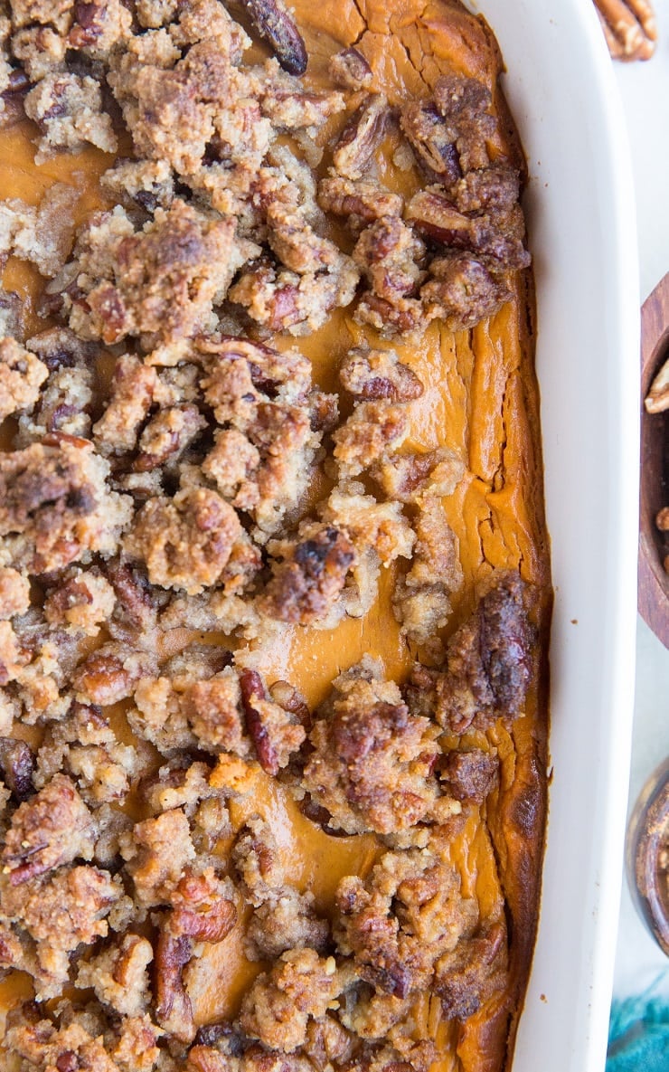 Healthy Sweet Potato Soufflé recipe with a pecan streusel topping. Grain-free, refined sugar-free, dairy-free and delicious!