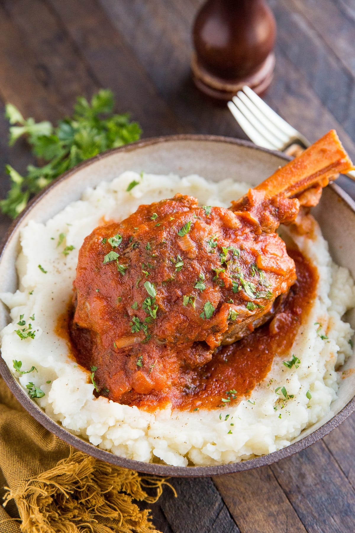 Easy Crock Pot Lamb Shanks - an easy method for braising lamb shanks in a delicious tomato based sauce.