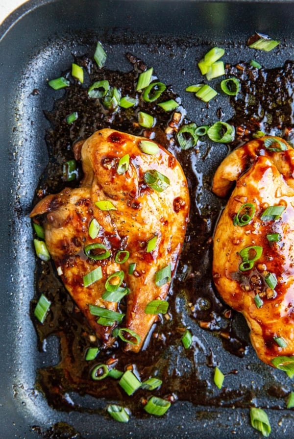 Asian chicken breasts in a casserole dish