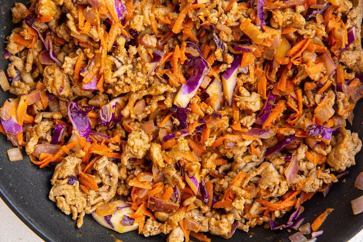 Turkey and vegetable mixture in a large skillet to make wraps.