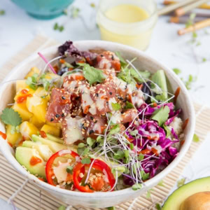 Ahi Poke Sushi Bowls with Wasabi Mayo, mango, avocado, microgreens, rice, and more.