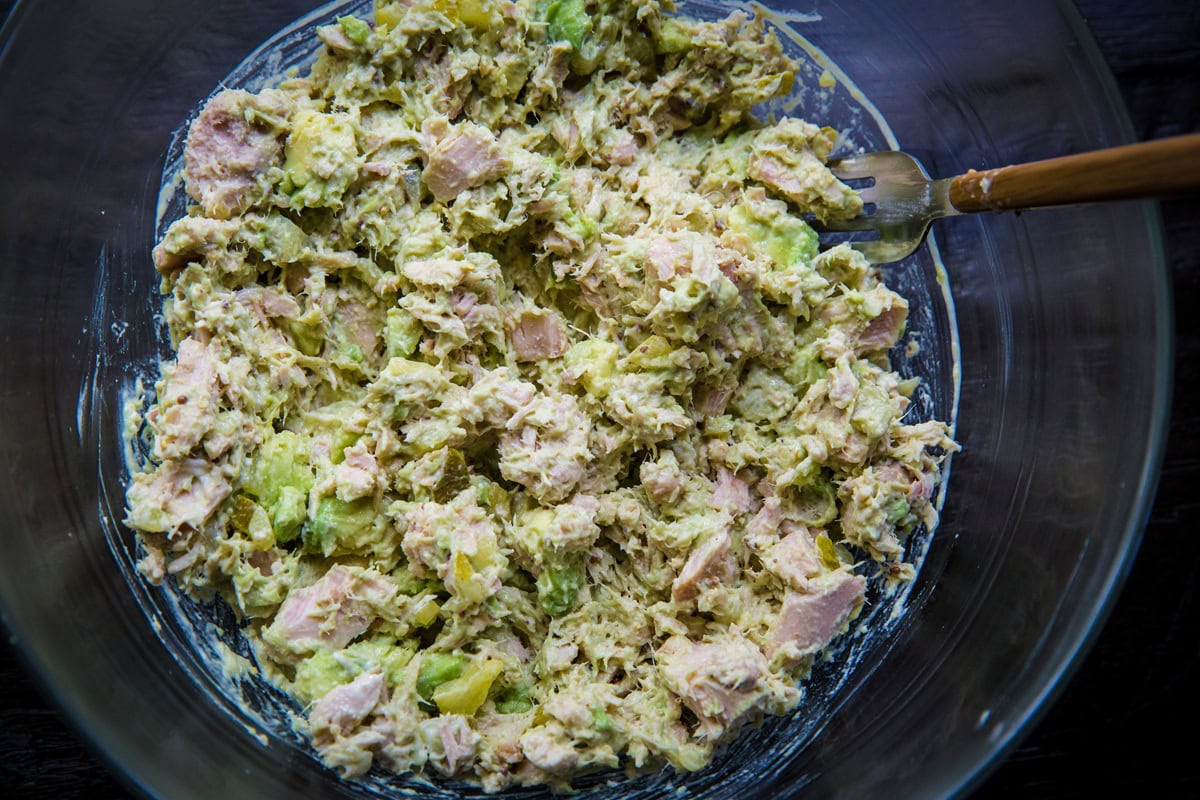 Avocado tuna salad in a bowl, all mixed up and ready to serve.