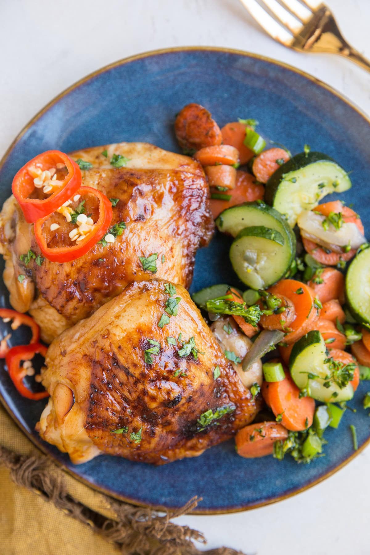 Easy Baked Teriyaki Chicken Thighs on a plate.