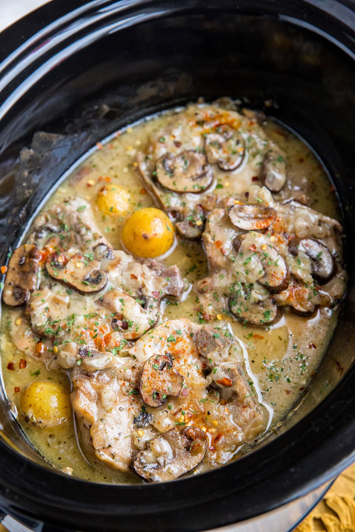 Crock Pot Pork Chops with Potatoes and Mushrooms - a hearty, healthy slow cooker recipe that is so filling and flavorful!