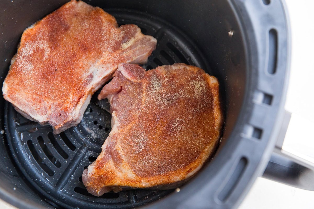 Place the pork chops in the air fryer