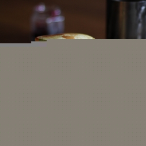 Stack of gluten-free pancakes on a plate.