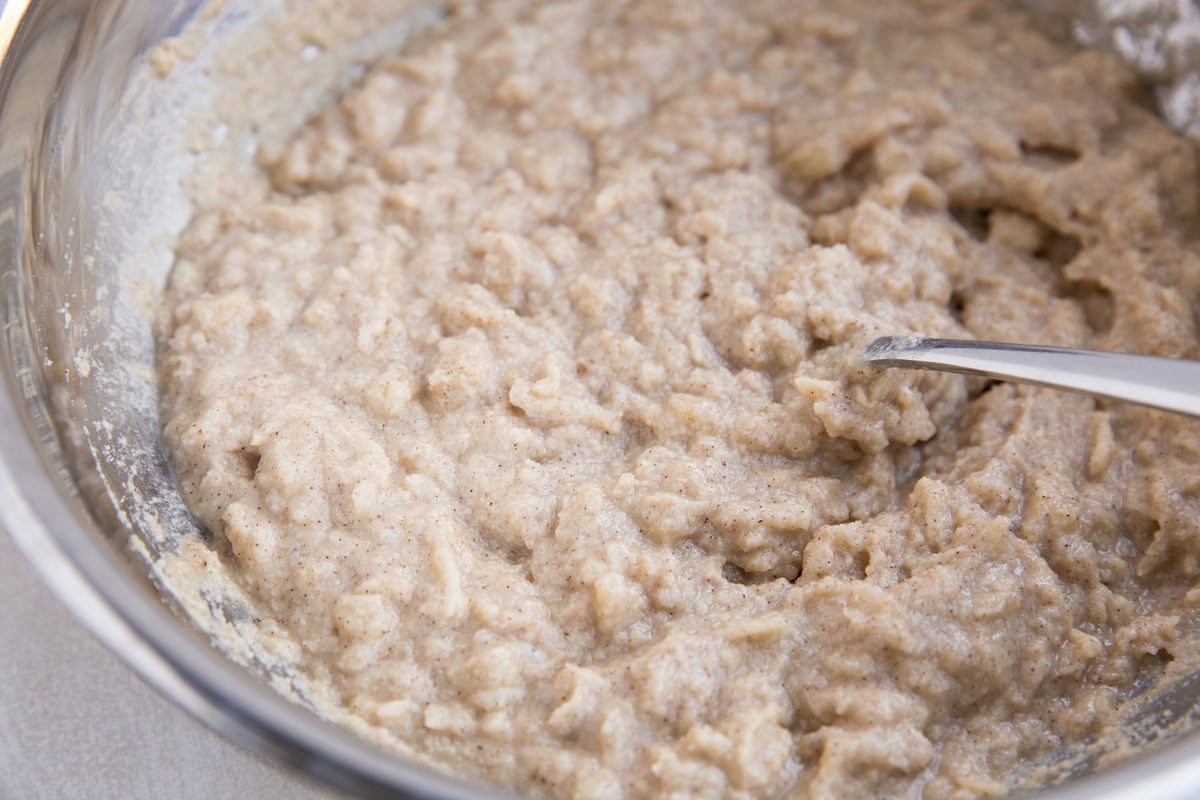 Mixing bowl full of apple muffin batter, ready to bake.