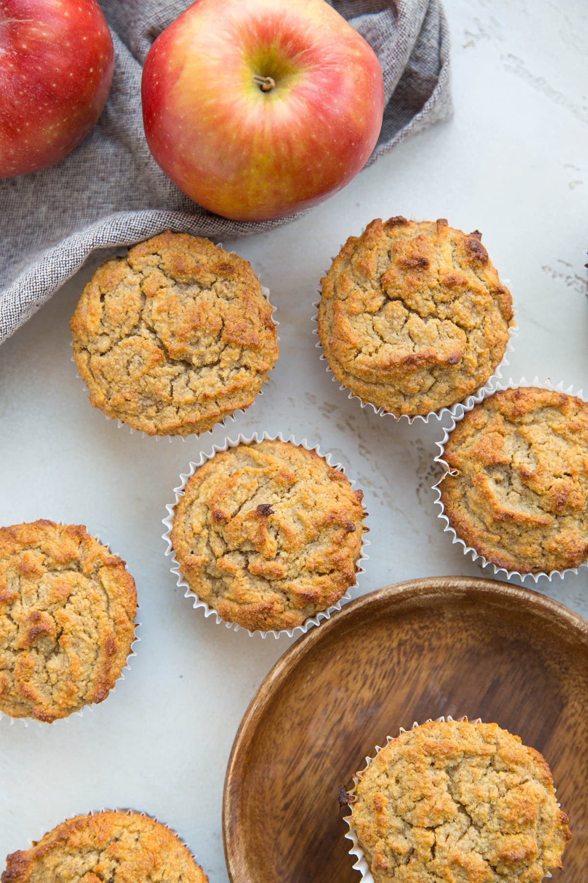 Healthy Apple Muffins made with almond flour, sweetened with banana and apple. This grain-free, dairy-free, refined sugar-free apple cinnamon muffins recipe contains no added sweetener!