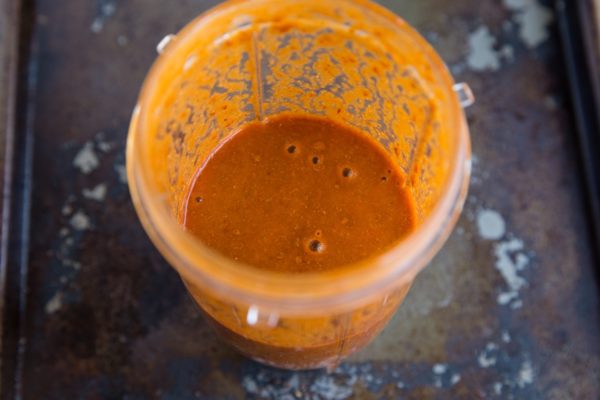adobo sauce for barbacoa beef blended up in a small blender.
