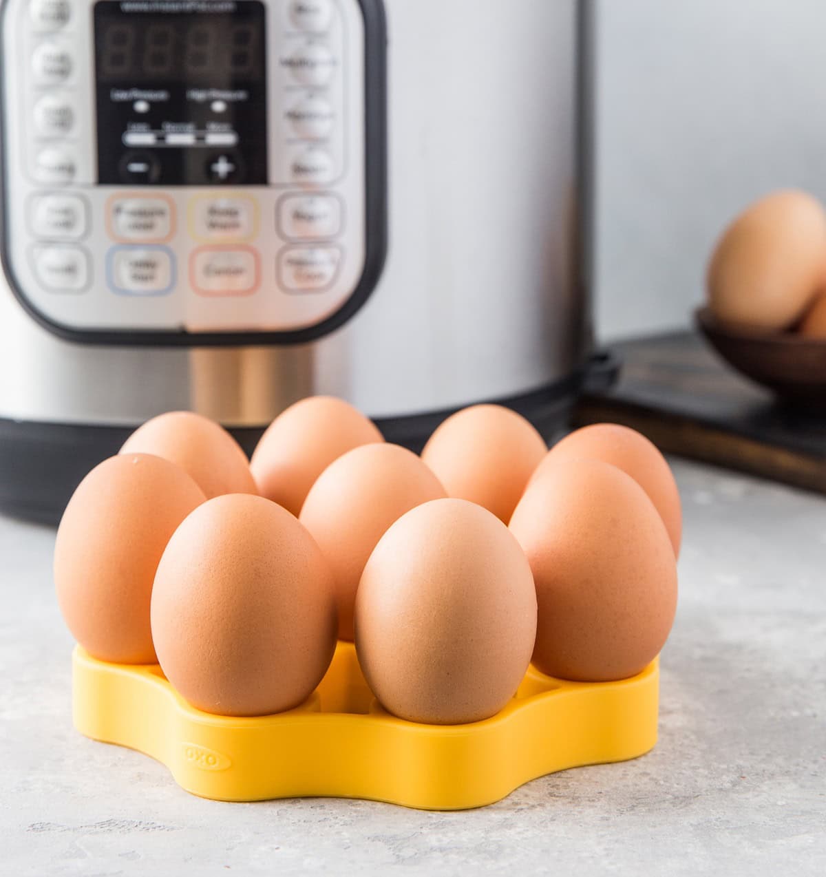 Silicone trivet full of eggs to go into the pressure cooker.