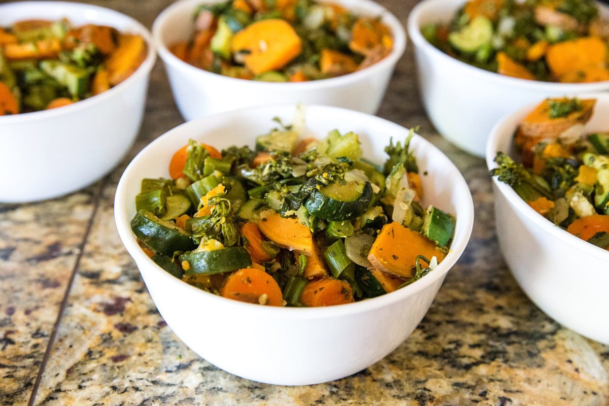 Meal prep bowls with chicken and vegetables