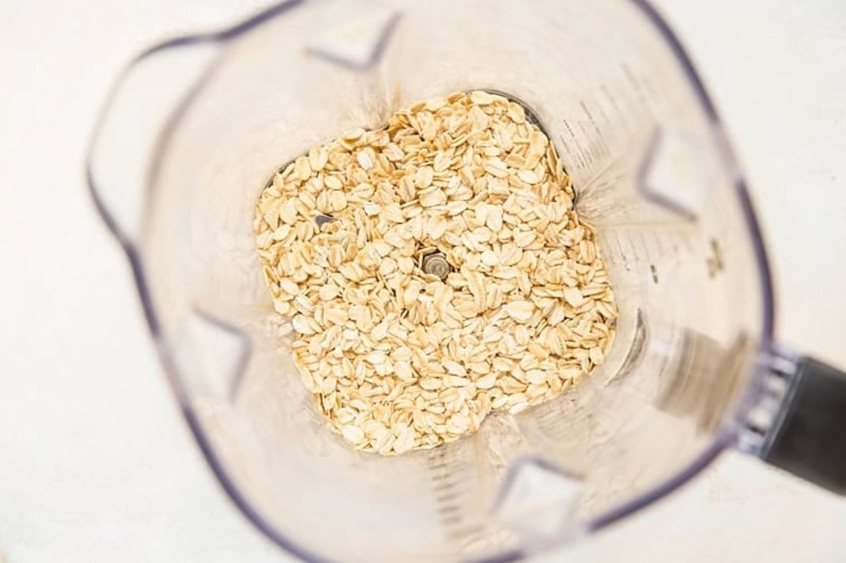 Oats in a blender, ready to be blended into a flour to make a recipe.