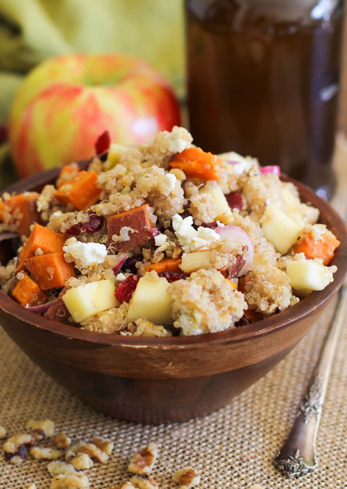 Large wooden bowl full of sweet potato quinoa salad