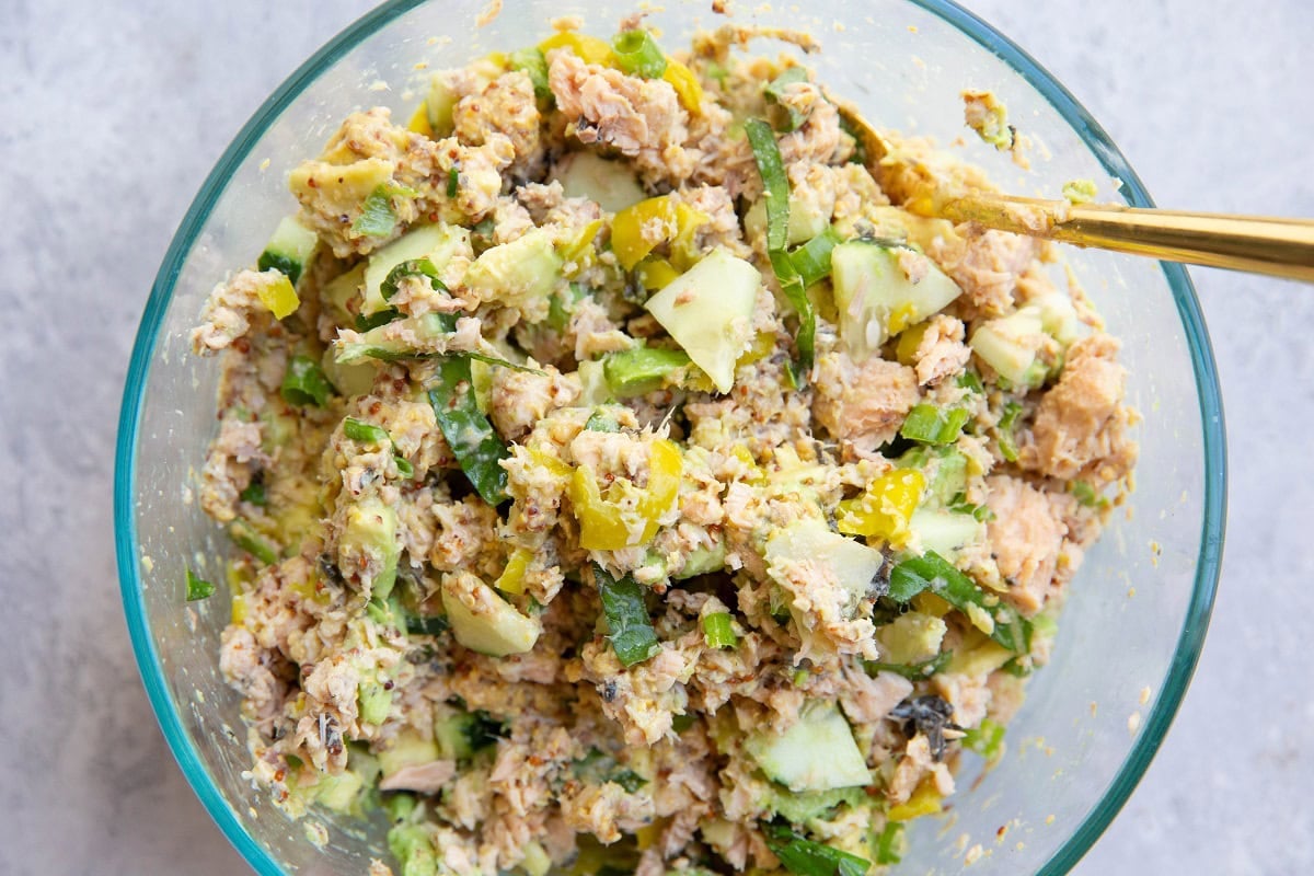 Easy salmon salad mixed up in a mixing bowl.