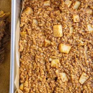 Baking pan of pumpkin apple bars, fresh out of the oven and ready to eat.