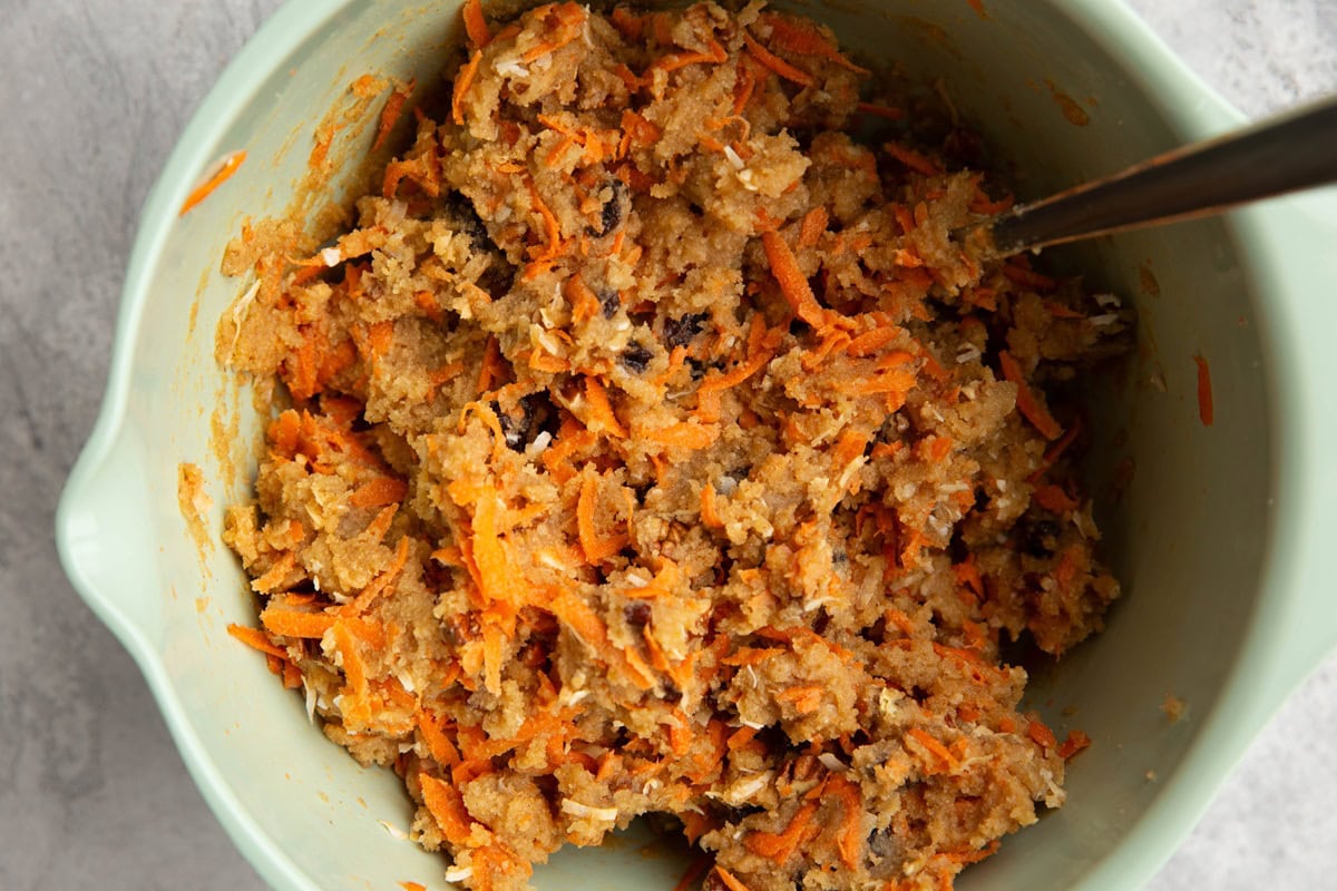 Big bowl full of carrot cake scone dough, ready to be baked.
