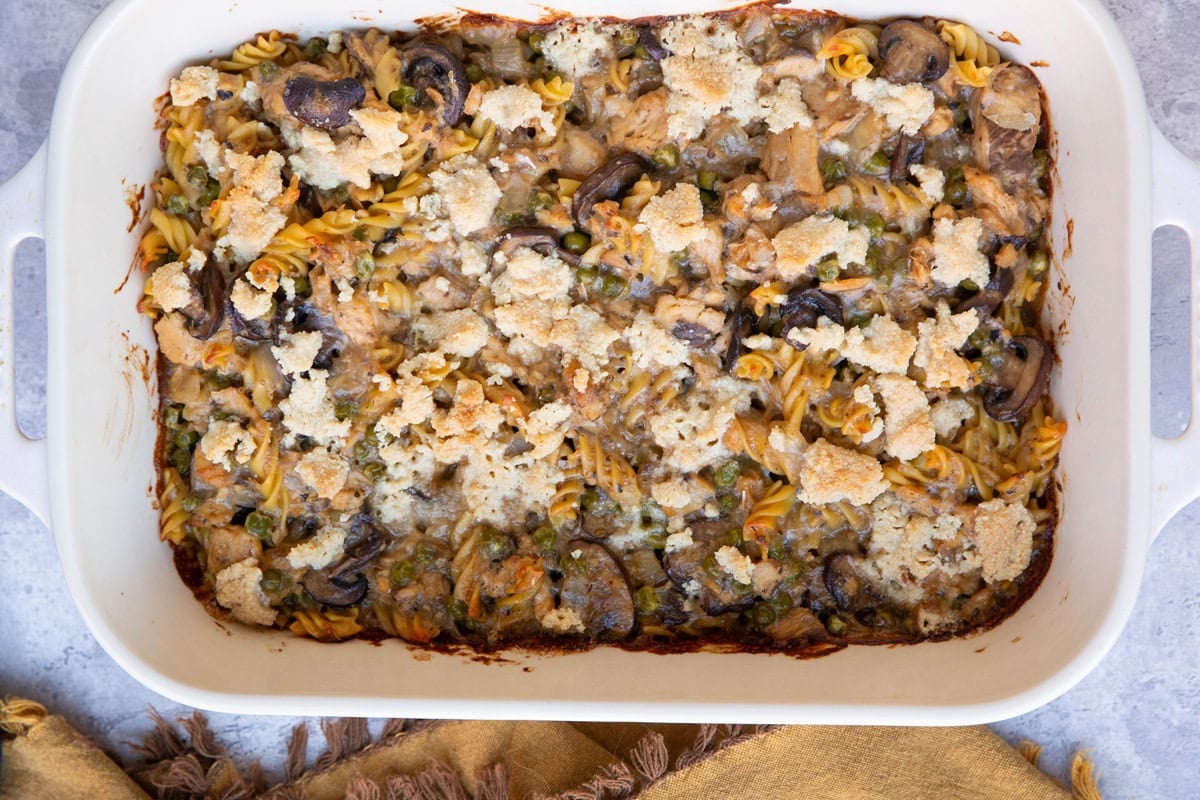 Casserole dish full of salmon noodle casserole.