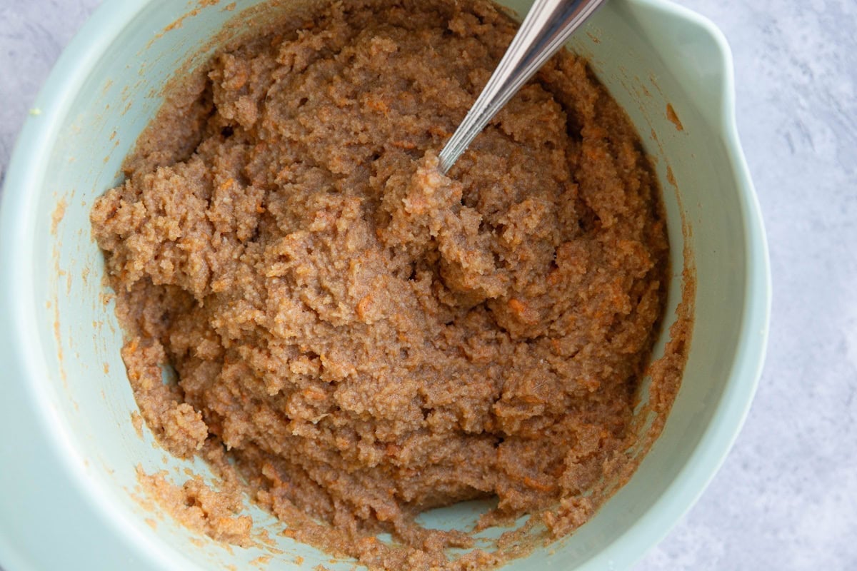 Sweet potato muffin batter in a mixing bowl, ready to bake.