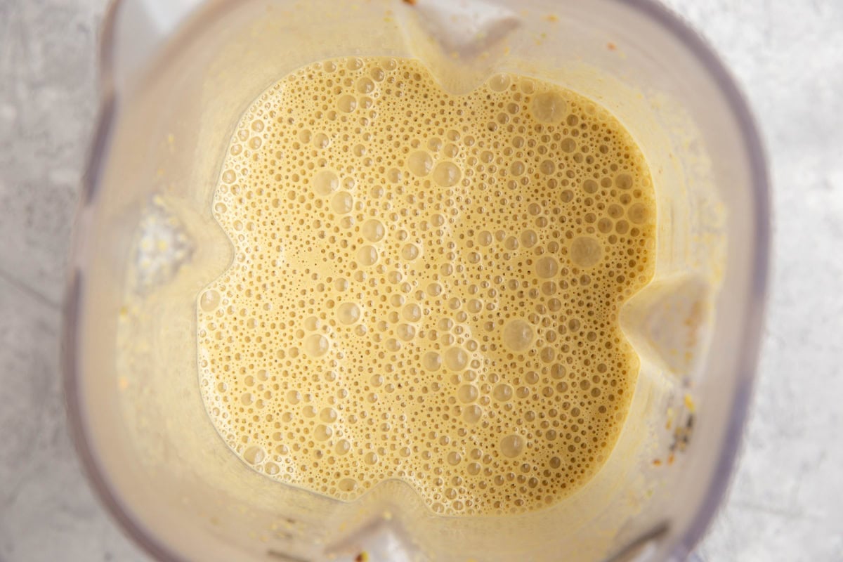Blender full of pistachio ice cream base.